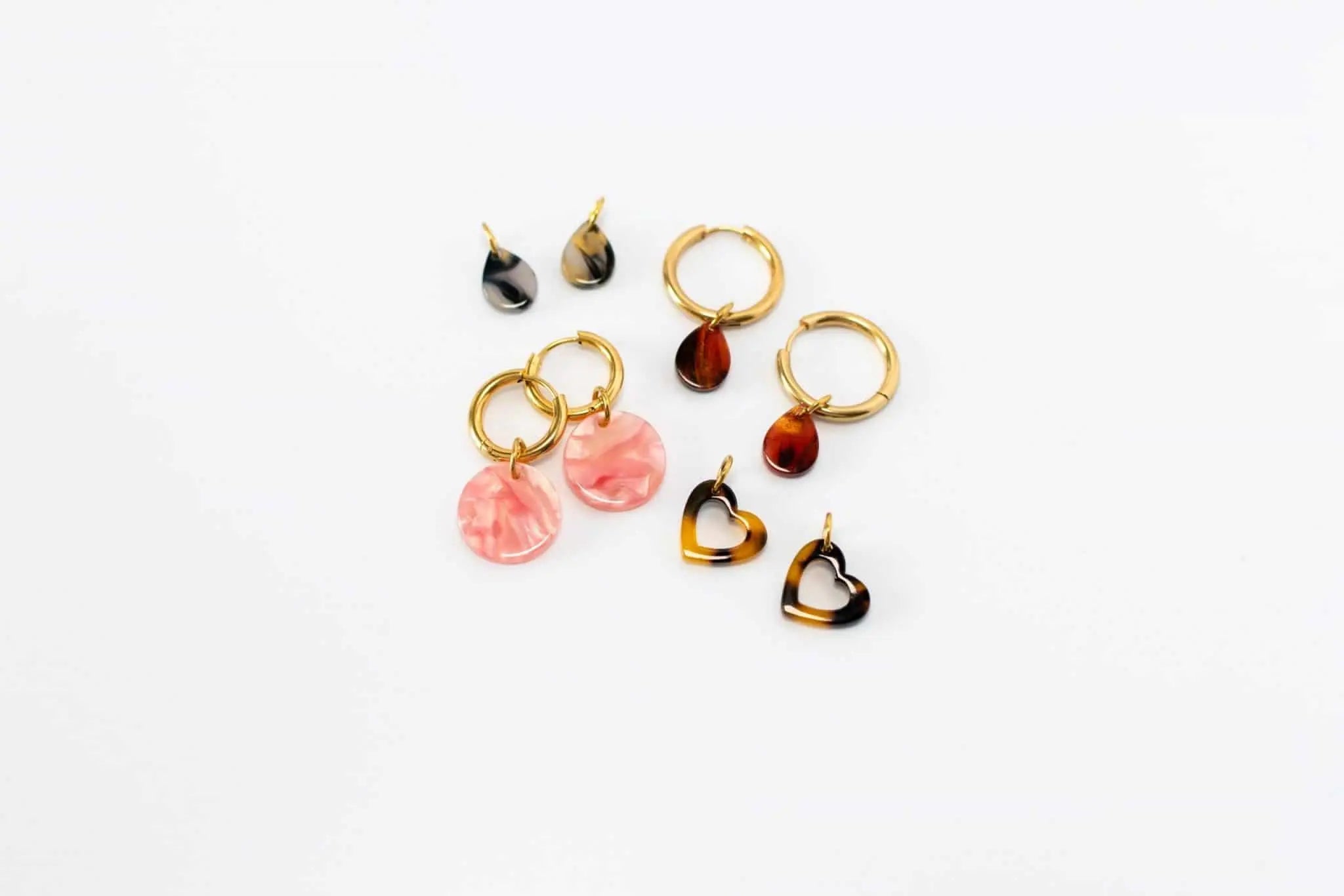 How to Rock the Mismatched Earring Trend | Jewelry Guide